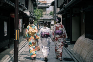 Three Japanese women in traditional clothes