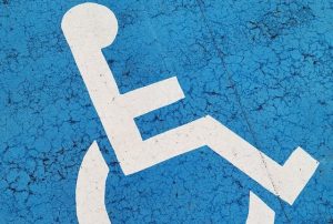 Disabled Sign Person In A Wheelchair.