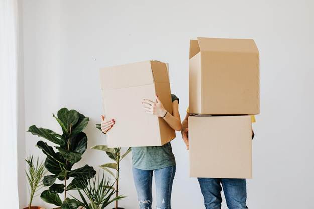 Alt: people holding cardboard boxes
Caption: Dishonest reviews are doing more harm than just financial harm. Image Credit: https://www.pexels.com/photo/couple-carrying-cardboard-boxes-in-living-room-4506270/