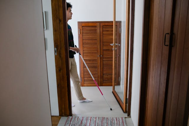 A man using a walking stick