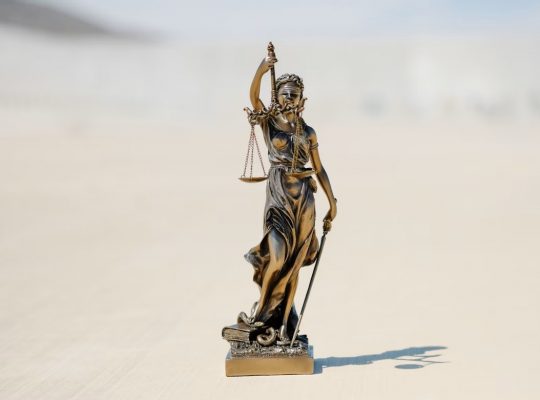 Image Description and Credit: https://unsplash.com/photos/a-statue-of-a-person-holding-a-staff-kjXbfNTPMHY?utm_source=unsplash&utm_medium=referral&utm_content=creditCopyText and https://unsplash.com/@wesleyphotography?utm_source=unsplash&utm_medium=referral&utm_content=creditCopyText