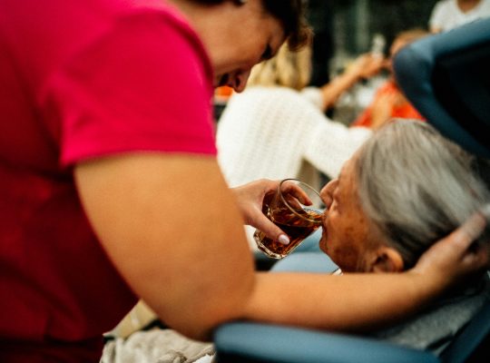 Image Description:: Caretaker giving tea to elderly patient Image Credit: Jsme MILA Image Source: https://www.pexels.com/photo/caretaker-giving-tea-to-elderly-patient-16364307/