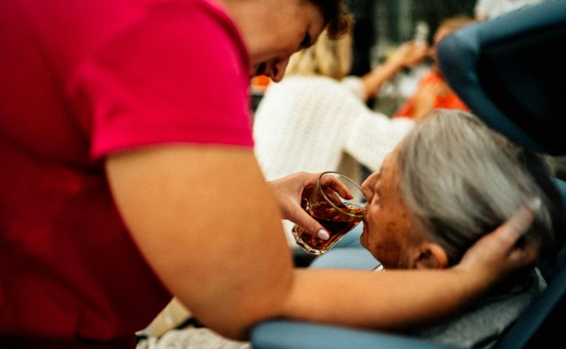 Image Description:: Caretaker giving tea to elderly patient Image Credit: Jsme MILA Image Source: https://www.pexels.com/photo/caretaker-giving-tea-to-elderly-patient-16364307/