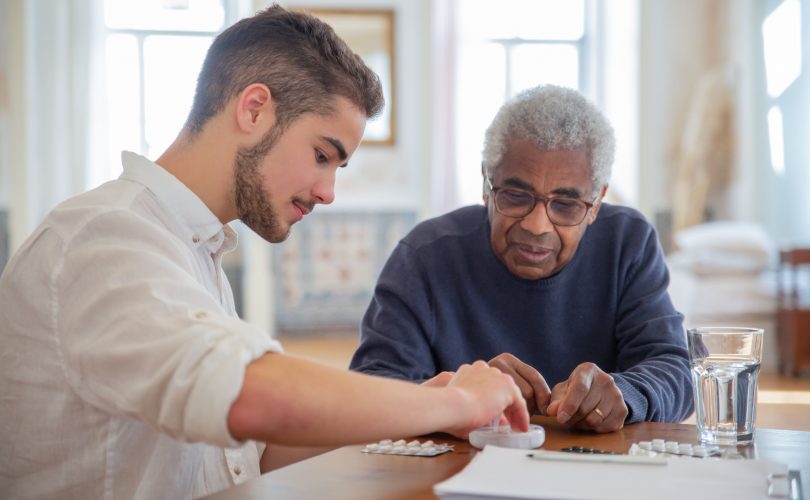 Image Description: A man in a blue sweater sitting beside a man in white long sleeves Image Credit: Kampus Production Image Source: https://www.pexels.com/photo/a-man-in-blue-sweater-sitting-beside-man-in-white-long-sleeves-7551646/