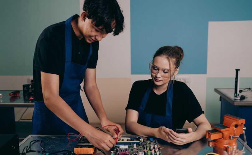 Image Description: Man and Woman Testing a Motherboard Image Credit: Mikhail Nilov - https://www.pexels.com/@mikhail-nilov/ Image Source: https://www.pexels.com/photo/man-and-woman-testing-a-motherboard-9242807/