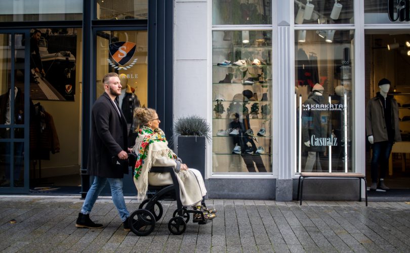 Image Description: Man pulling woman in wheelchair Image Credit: Rollz International: https://www.pexels.com/@rollz/ Image Source: https://www.pexels.com/photo/man-pulling-woman-in-wheelchair-19903419/