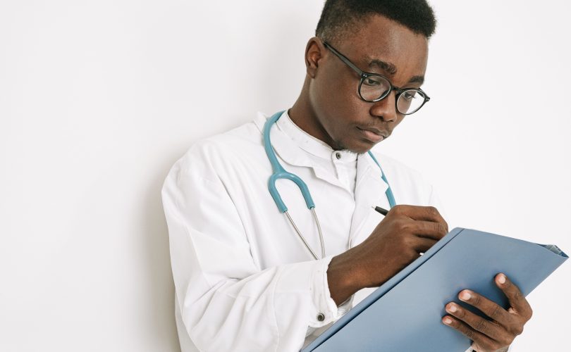 Image Description: A doctor writing on a folder Image Credit: https://www.pexels.com/@ivan-s/ Image Source: https://www.pexels.com/photo/a-doctor-writing-on-a-folder-4989132/