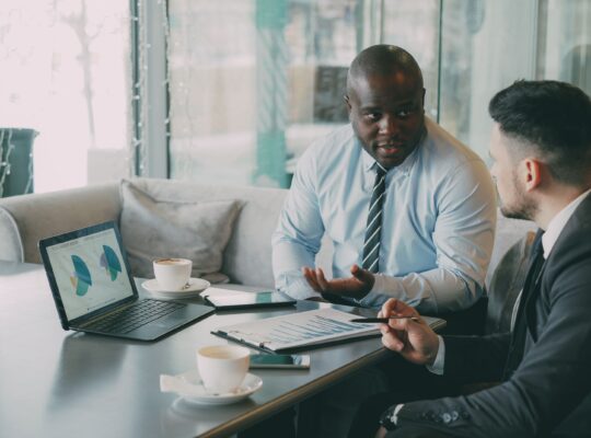 Image Description: Business meeting in modern office setting. Image Credit: Vitaly Gariev:: https://www.pexels.com/@silverkblack/ Image Source: https://www.pexels.com/photo/business-meeting-in-modern-office-setting-36766695/